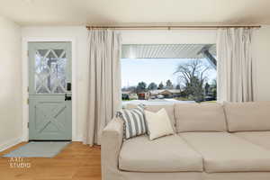 Sitting room featuring wood finished floors and baseboards