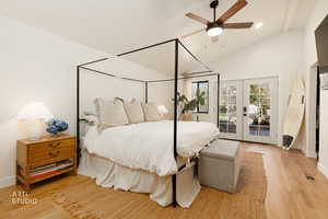 Bedroom with french doors, access to outside, a ceiling fan, light wood-type flooring, and vaulted ceiling