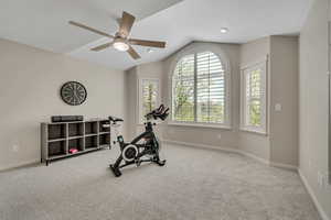 Bedroom 2nd, recreation room, or Workout area with light colored carpet and a ceiling fan