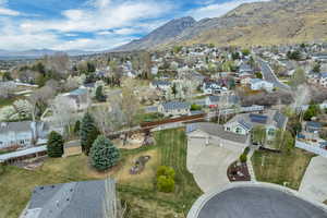 Aerial view of residential area with a mountain backdrop