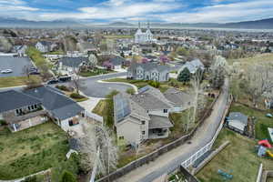 Aerial view of residential area with a mountainous background