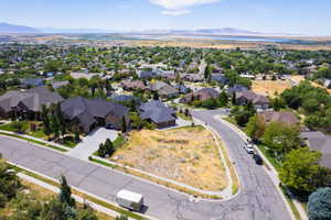 Aerial view of residential area featuring a mountain backdrop