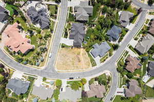 Aerial overview of property's location with nearby suburban area