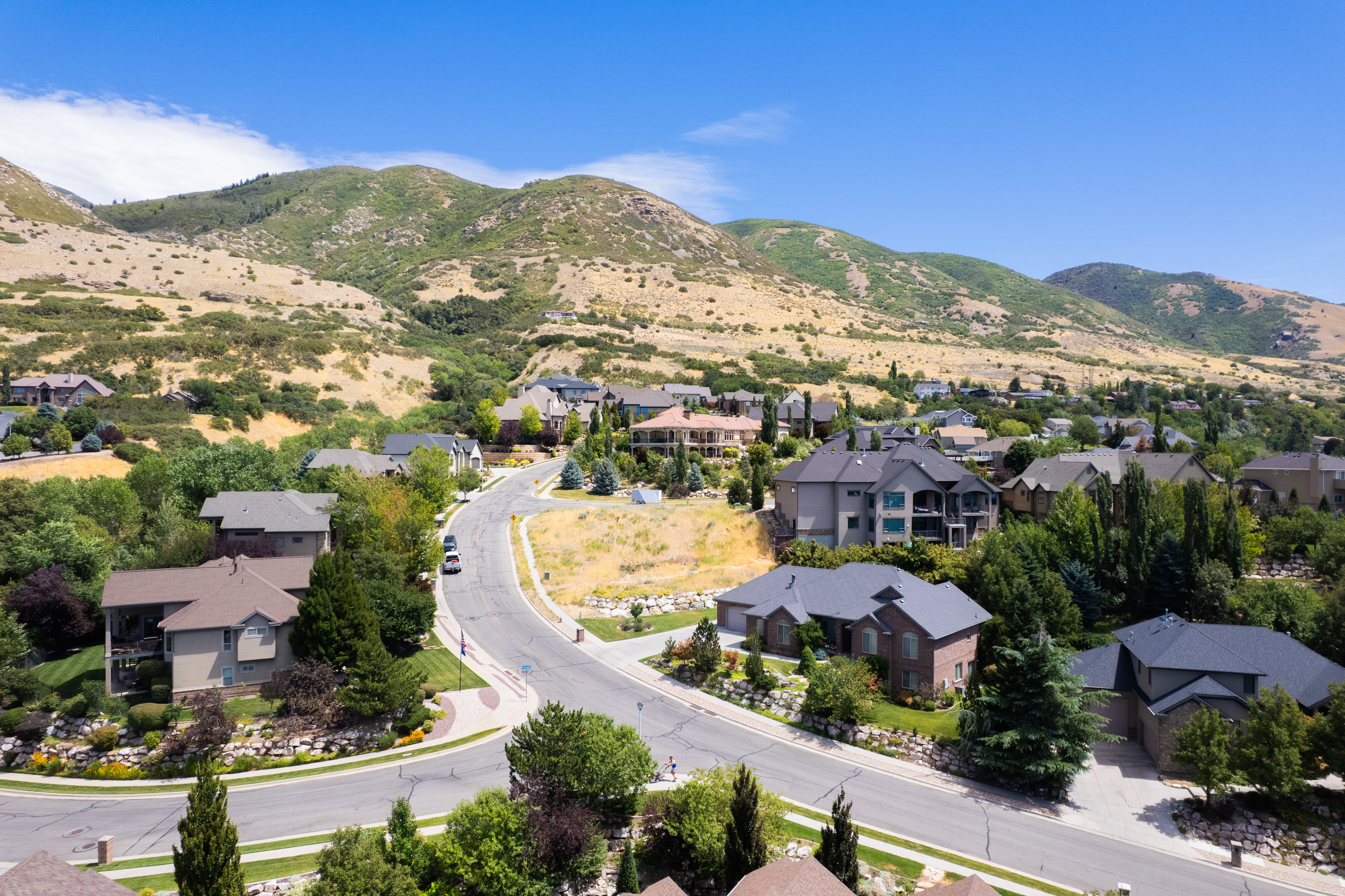 Aerial view of residential area with mountains