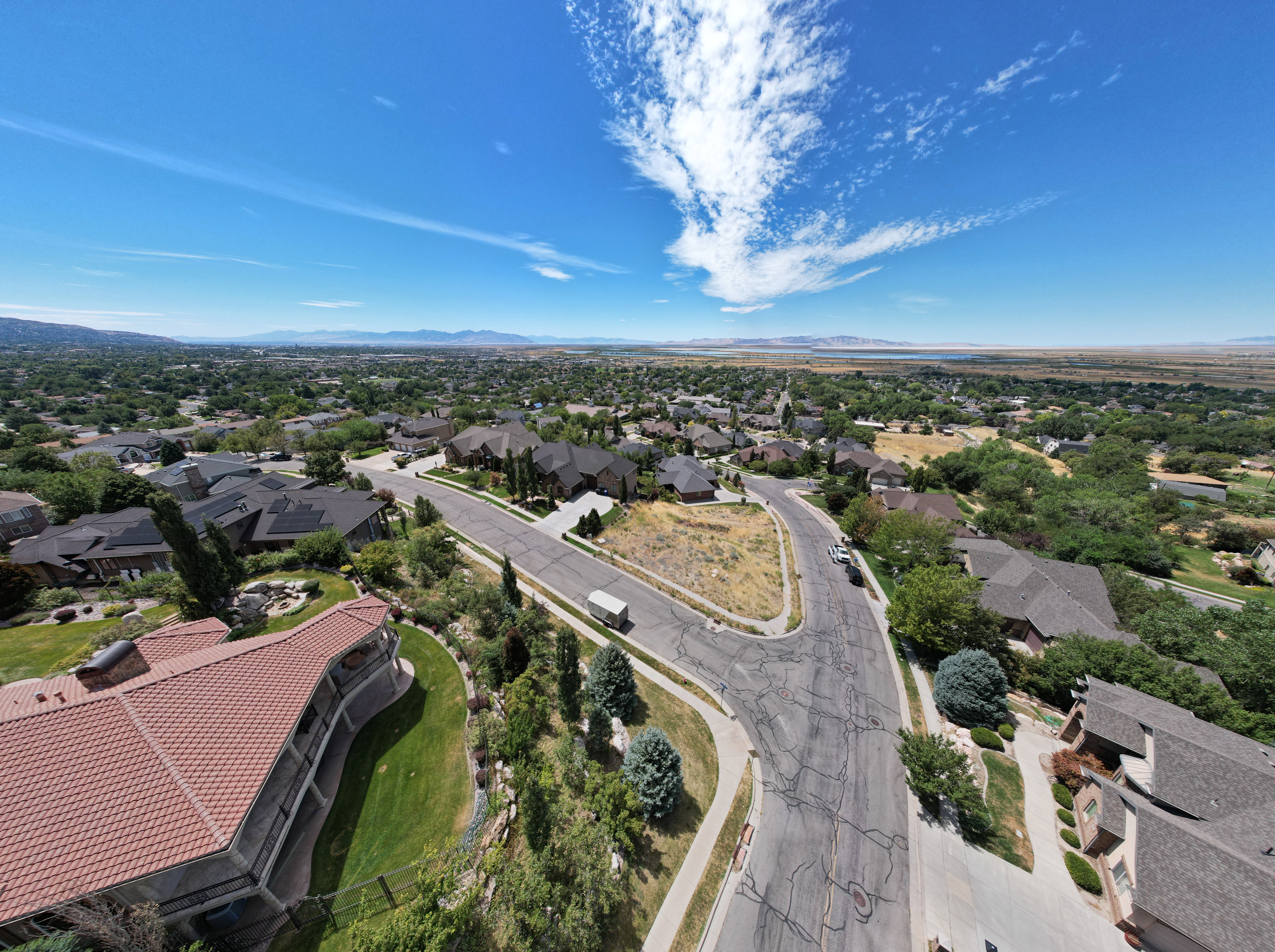 Aerial perspective of suburban area featuring mountains