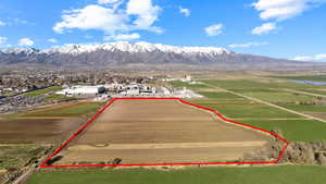 View of rural area featuring property parcel outlined and a mountain backdrop