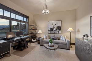 Office space featuring light carpet