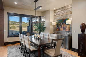 Dining room with light wood-style flooring