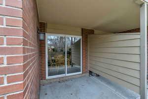 Property entrance featuring a patio