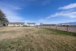 View of yard featuring an outbuilding