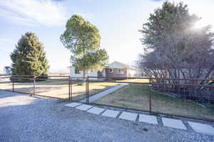 View of front of house with a gate