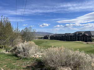 View of mountain backdrop featuring a golf course