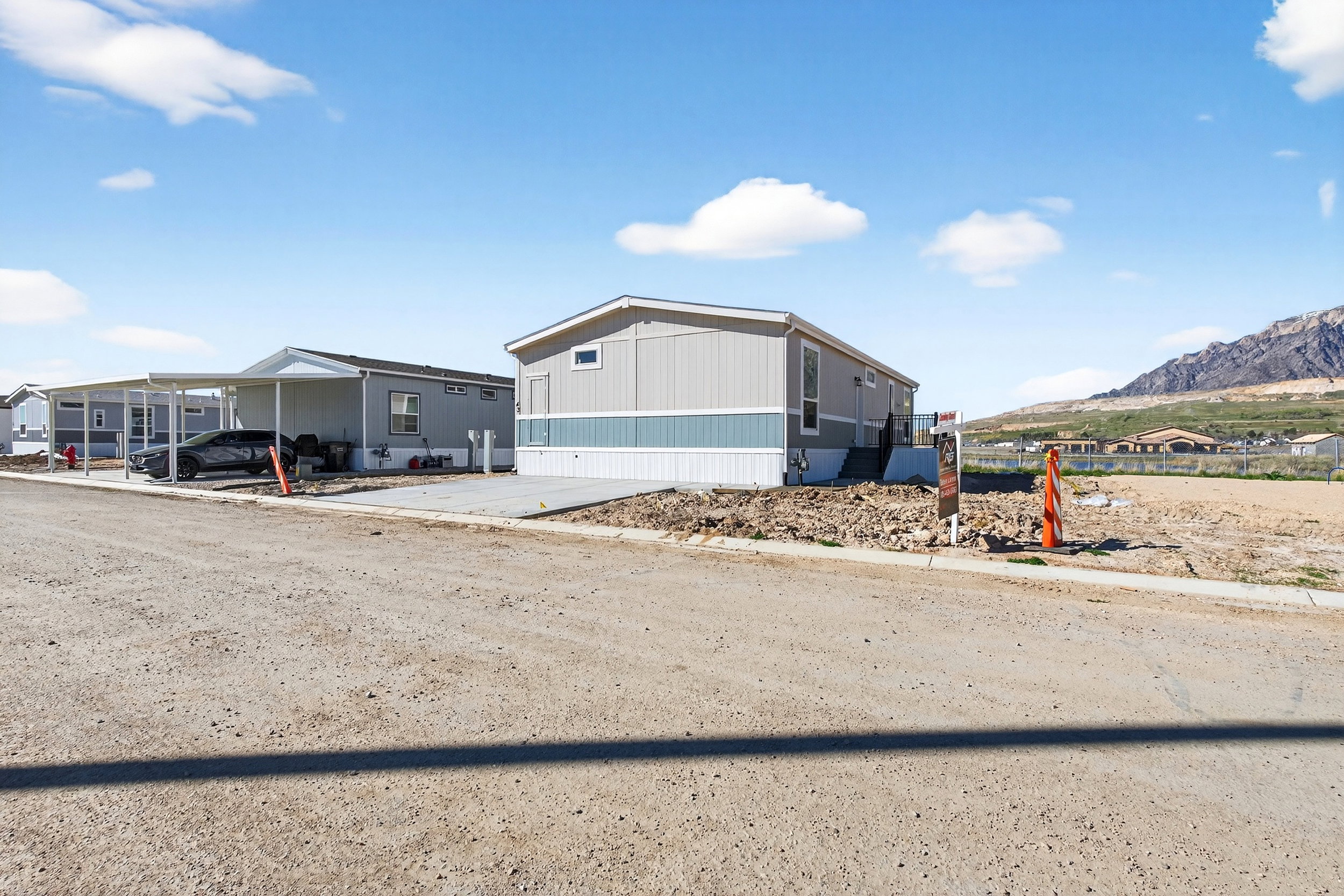View of front of property with a mountain view