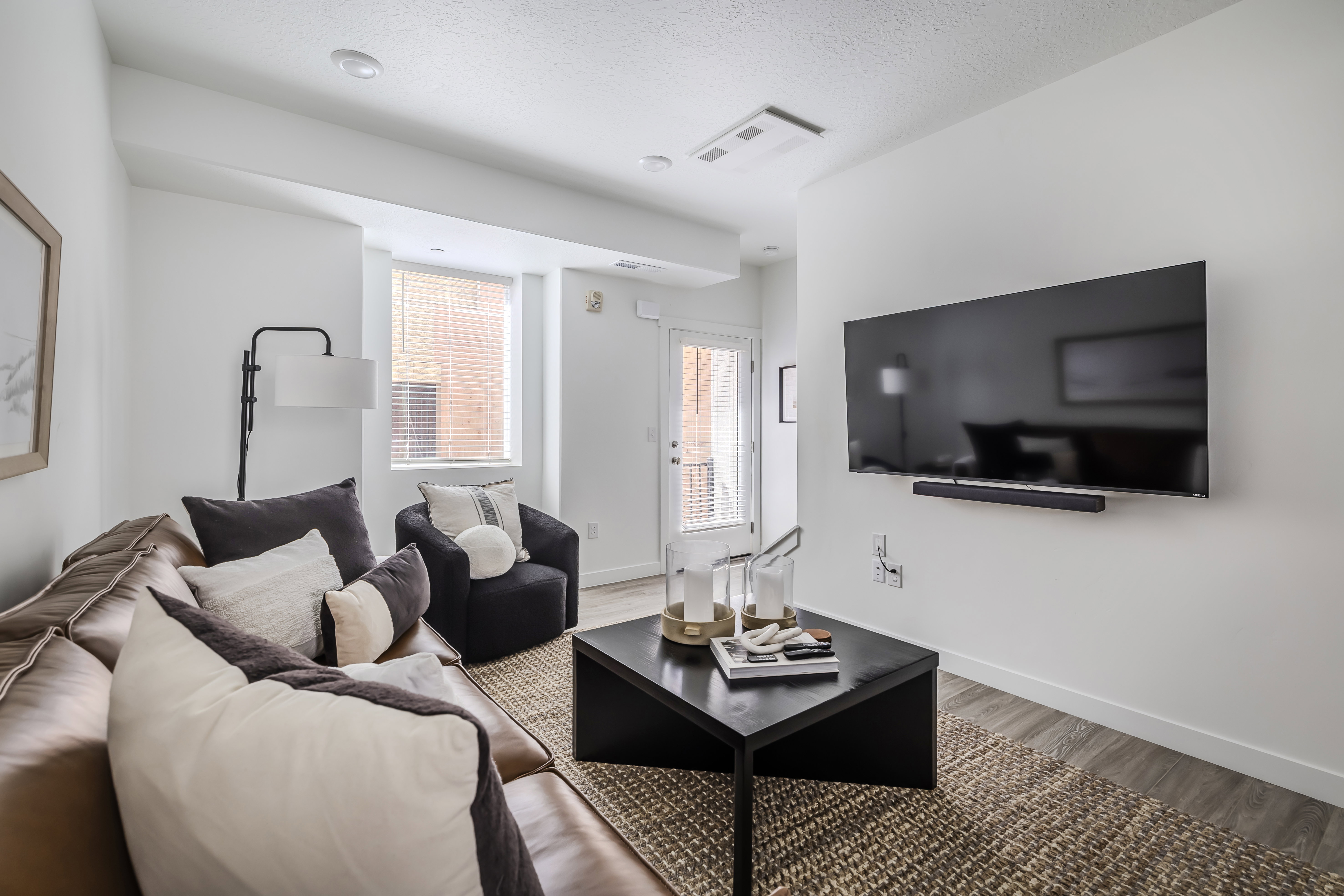 Living room with wood finished floors and baseboards