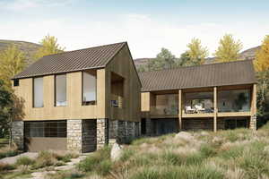 View of front of house featuring stone siding, a mountain view, and a standing seam roof