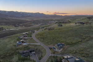 Aerial view of sparsely populated area with mountains