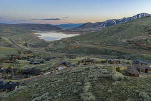 Mountain view featuring a nearby body of water