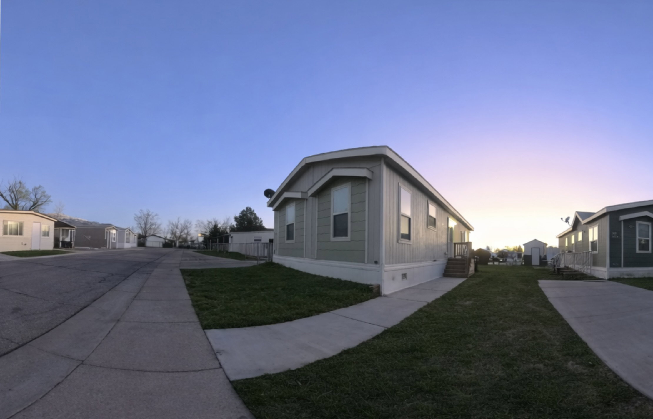 View of home's exterior featuring a yard, a residential view, and crawl space