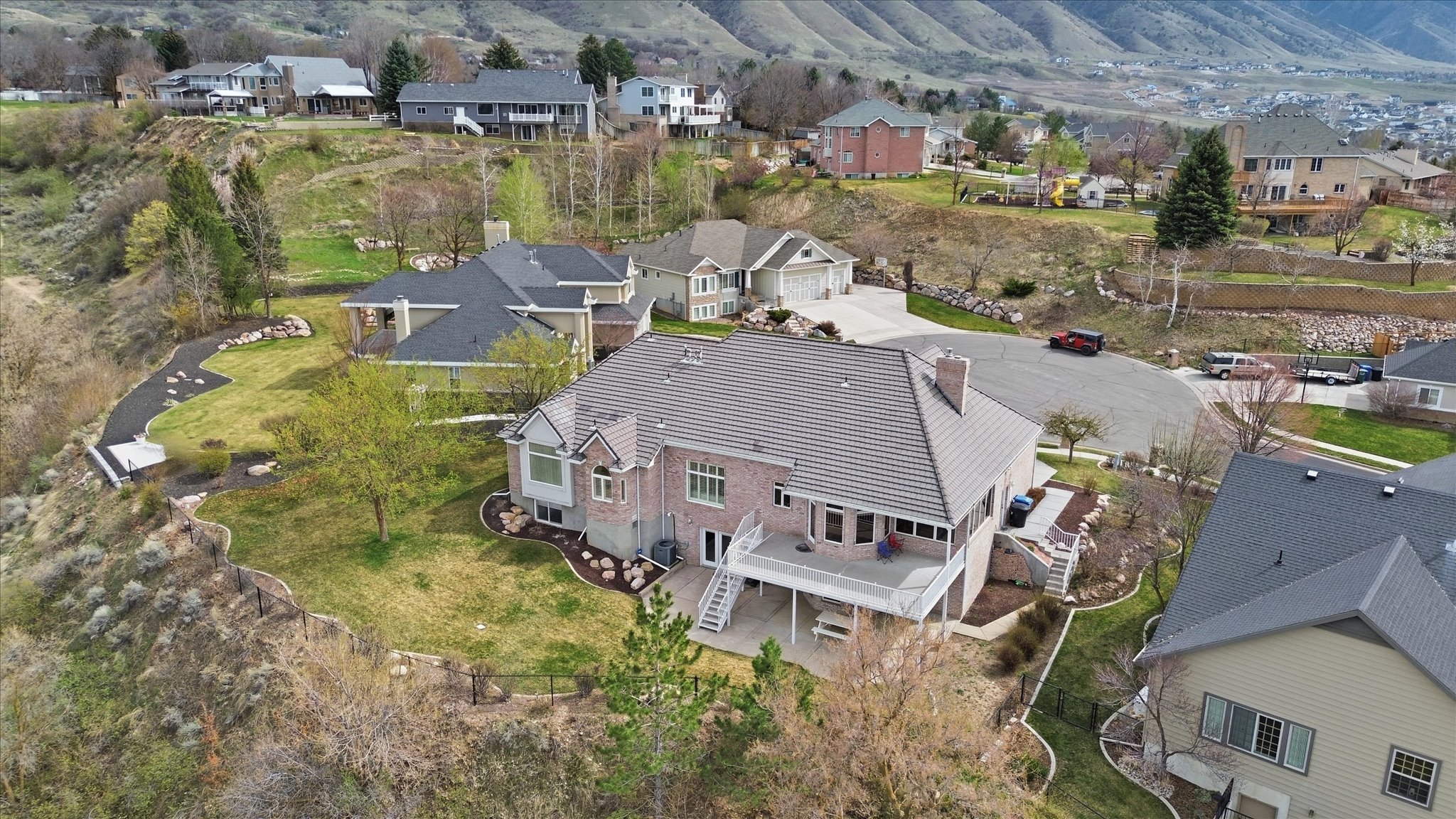 Aerial view of residential area featuring mountains