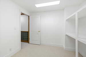 Interior space featuring light carpet