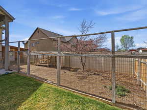 View of fenced backyard