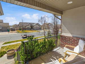 Balcony featuring a residential view