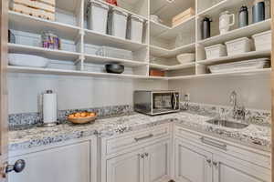 Pantry with a sink