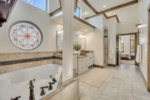 Vaulted Primary Bath with jetted tub and special stained glass window