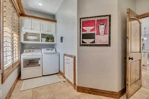 Laundry off mudroom entrance with dog-food drawer