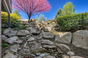 Water feature outside right below Primary bedroom's private deck