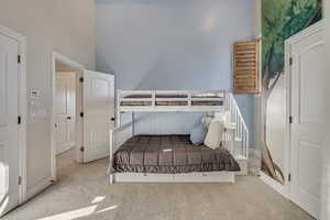 A laundry closet is in this bedroom for upstairs use