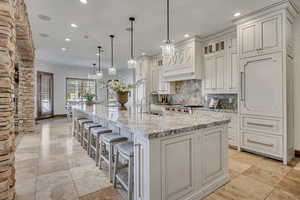16' Island with two sinks, two dishwashers and two fridge/freezers.