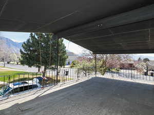 Covered patio above carport with mountain views