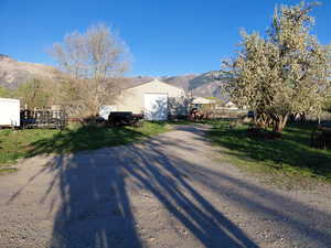 View of barn featuring a mountain view