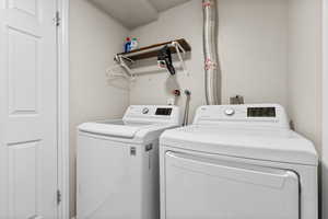 Laundry area with washing machine and dryer