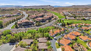 Aerial perspective of suburban area with a mountain backdrop