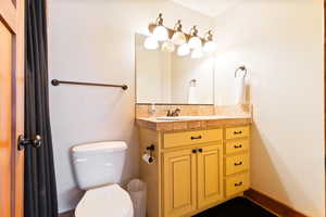 Bathroom with vanity and toilet