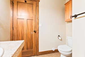 Bathroom with vanity and light tile patterned floors