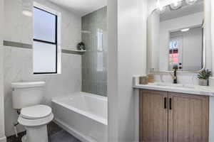 Full bathroom with vanity and tub / shower combination