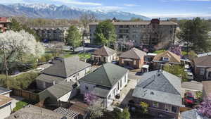 Aerial view of residential area featuring a mountain backdrop