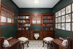Sitting room featuring crown molding