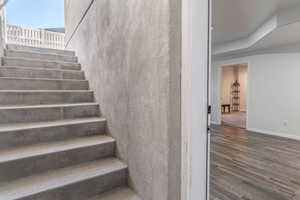 Basement entrance under steel awning.