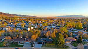 Aerial view at dusk of a mountain view and a residential view