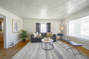 Living area featuring light wood-style floors