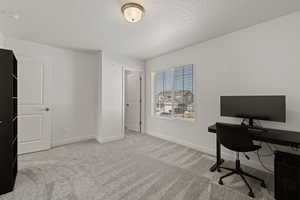 Second floor spare bedroom with large window and walk-in closet