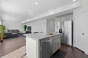 Open concept floorplan featuring spacious eat-in kitchen and large living room with plenty of natural light