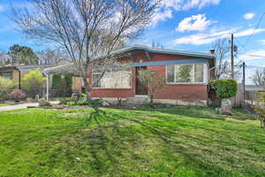 View of front of home with brick siding