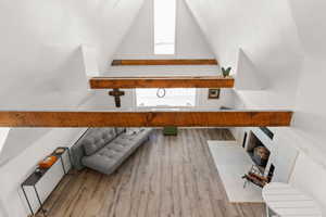 Interior space featuring light wood-style flooring and plenty of natural light