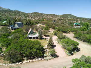 View from above of property featuring a mountain backdrop