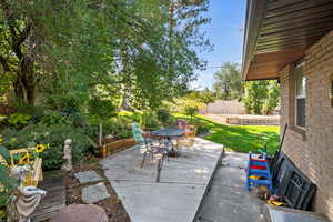 View of patio with outdoor dining area